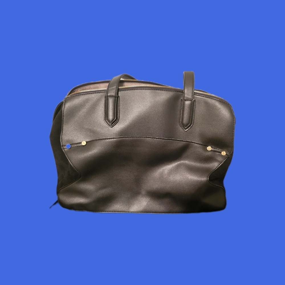 A large black and suede handbag .Rustic Boost